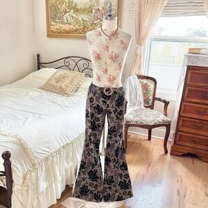 low rise flare pants  Y2K xoxo black floral low rise flare pants size 13 -